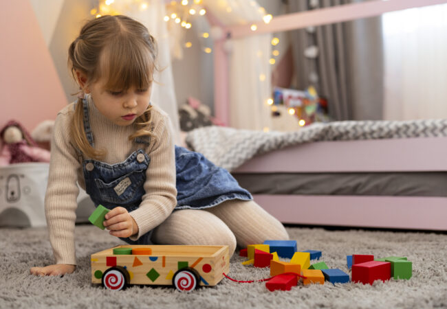 close-up-child-playing-her-room